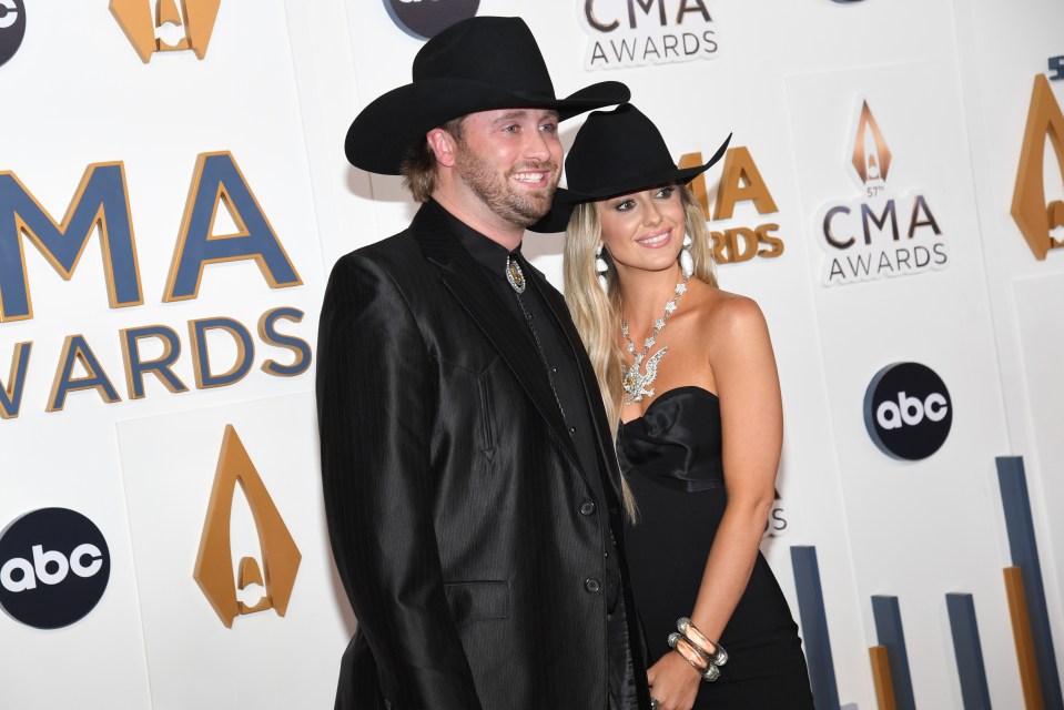 Lainey Wilson and Devlin Hodges arrive together at the 57th Annual Country Music Awards on November 08, 2023, in Nashville, Tennessee