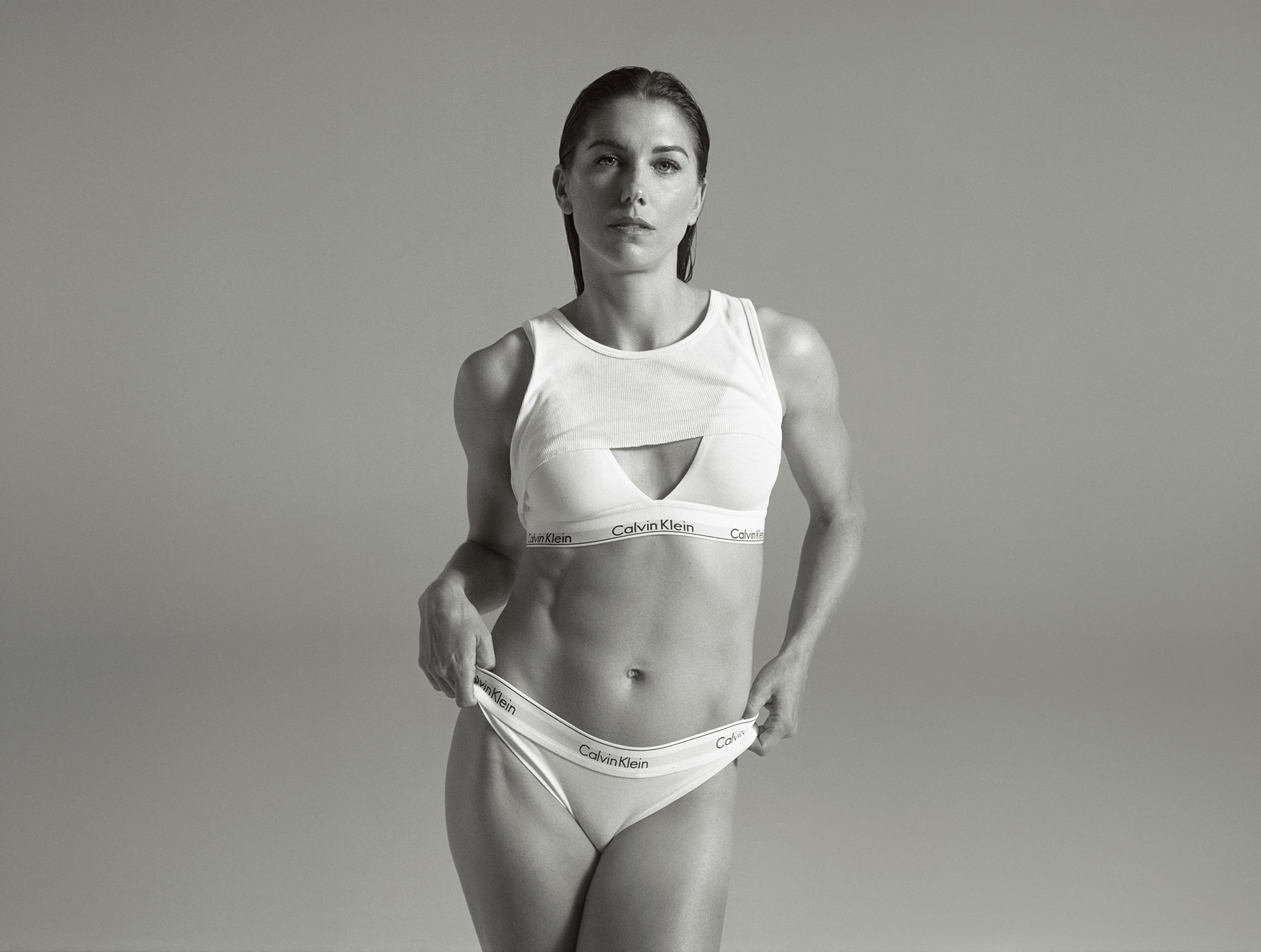 Alex Morgan strip down for a sultry Calvin Klein underwear shoot.