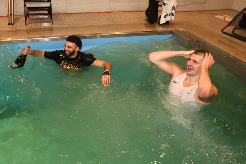 Jamal Murray and Nikola Jokic ended up in a swimming pool with champagne