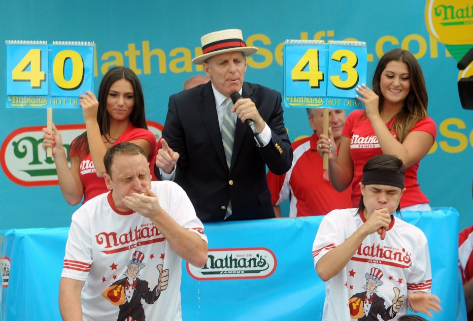 Matt Stonie (R) beat Joey Chestnut (L) at the 2015 Nathan's Famous 4th Of July International Hot Dog Eating Contest at Coney Island on July 4, 2015, in New York City