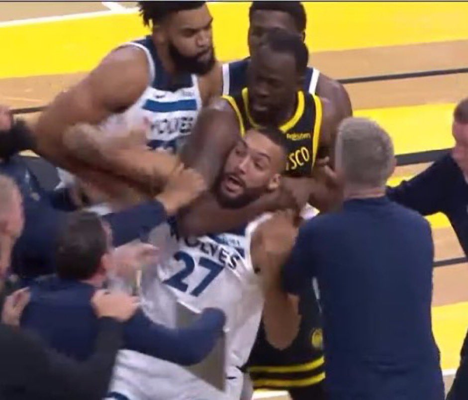 Golden State Warriors power forward Draymond Green put Minnesota Timberwolves center Rudy Robert in a headlock