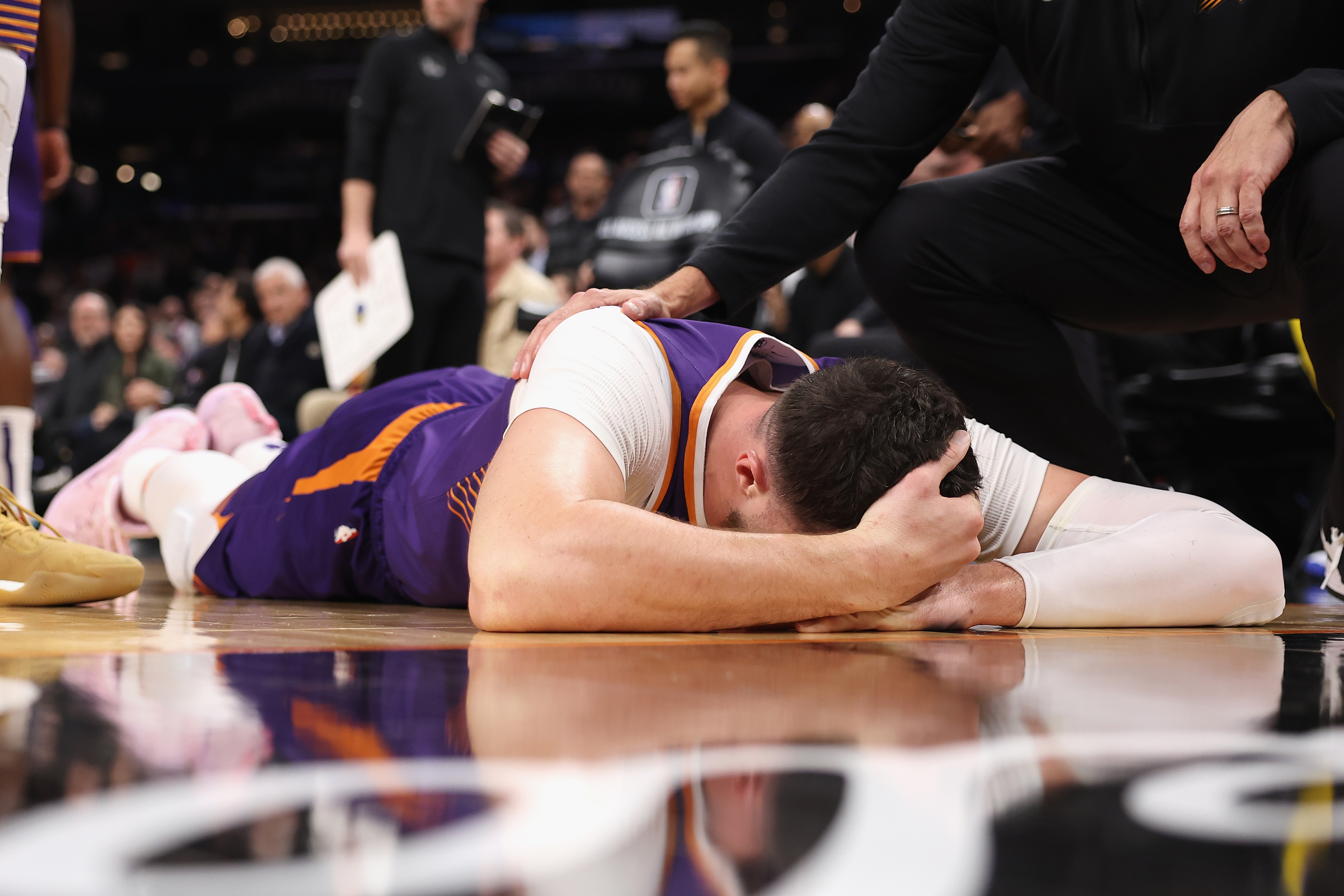 After he was struck by Draymond Green, Jusuf Nurkic (pictured) was seen tumbling onto the floor