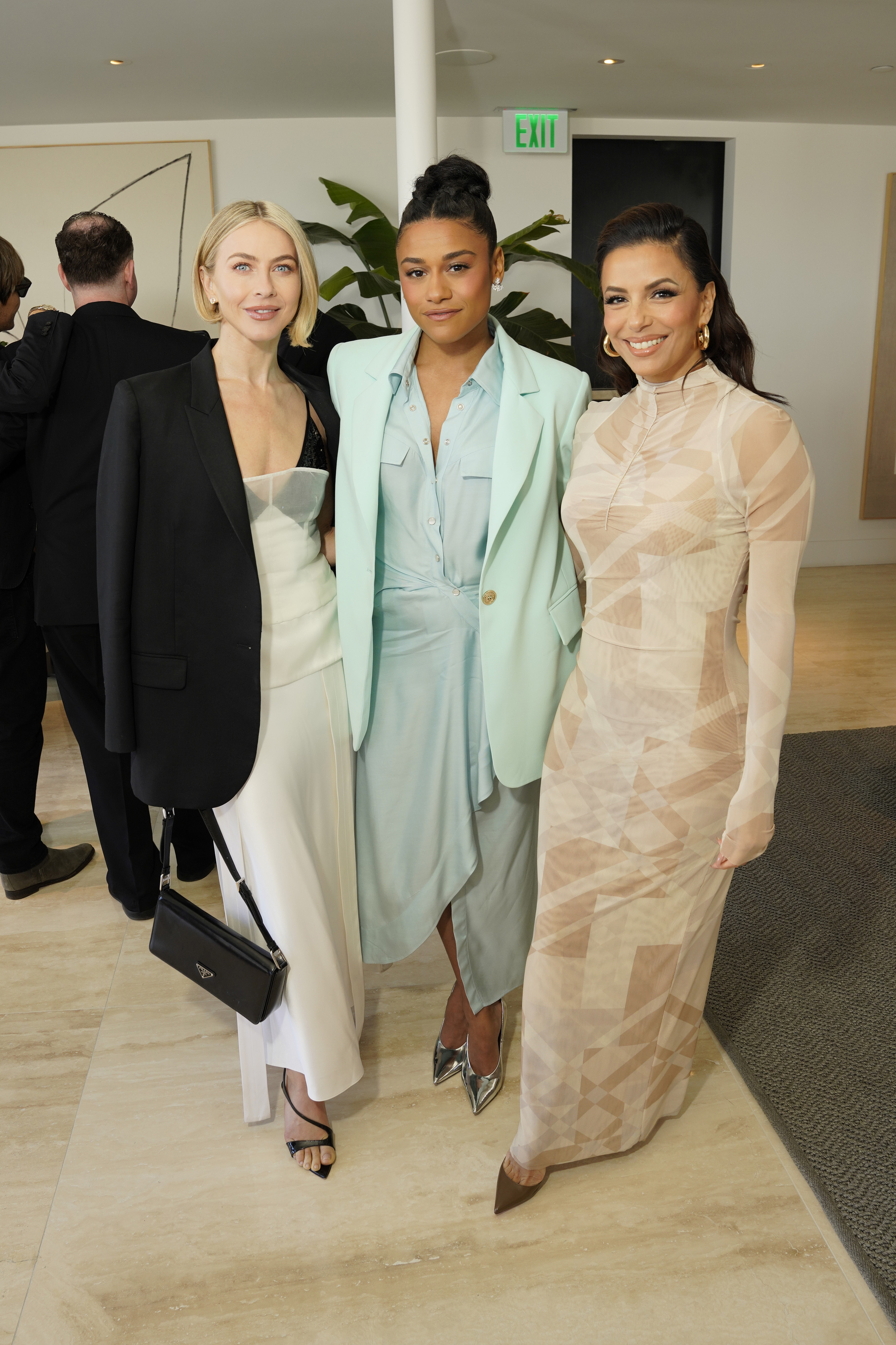 Julianne Hough posed with Ariana DeBose (center) and Eva Longoria (right)