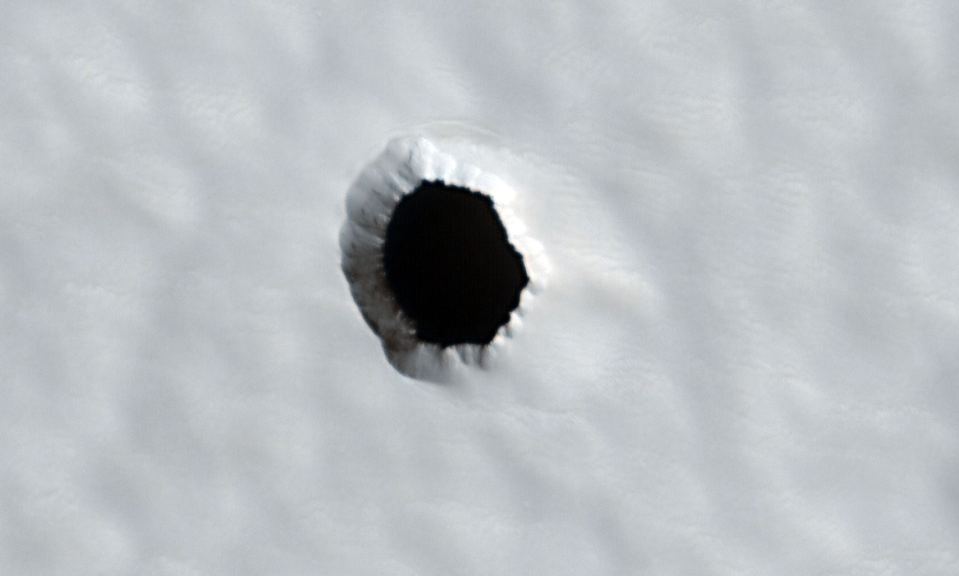 The mystery hole is on the Arsia Mons region of Mars