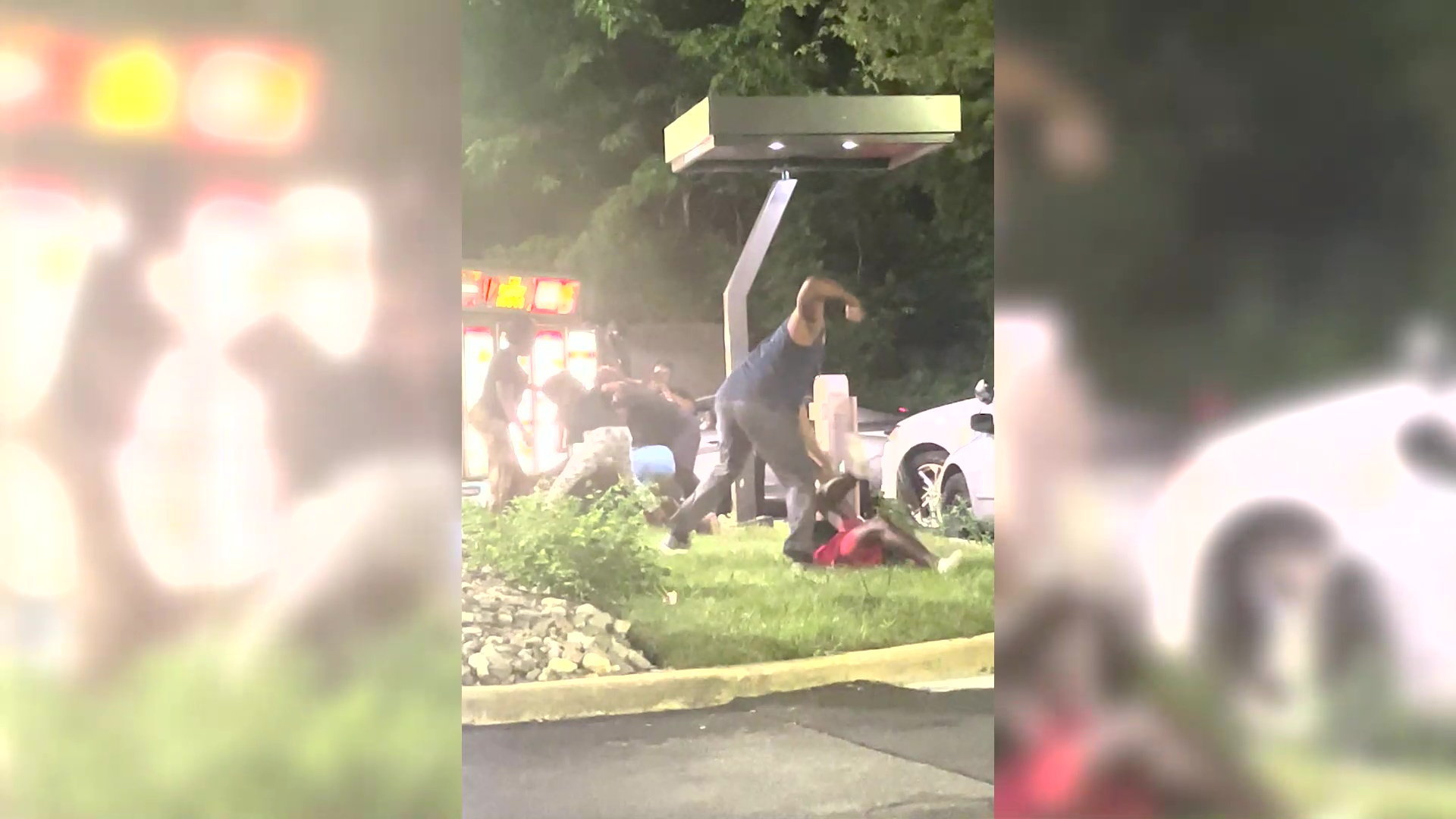 At least six people were seen brawling in a Baltimore Wendy's drive-thru due to an unknown dispute