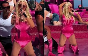 Christina Aguilera flashes very slim figure in pink bodysuit after weight loss