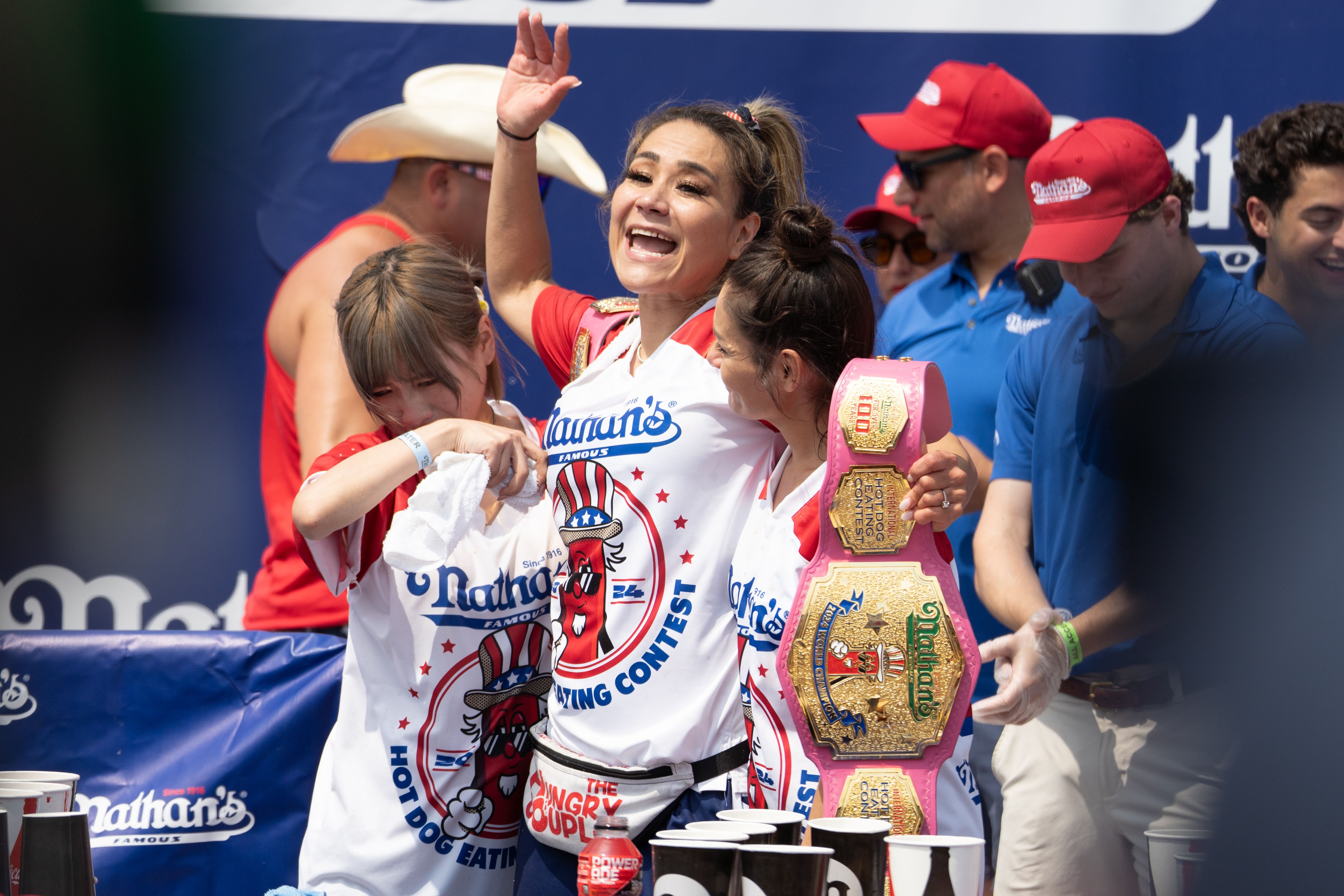 Miki Sudo set a new world record of 51 hot dogs and buns Credit: Rex