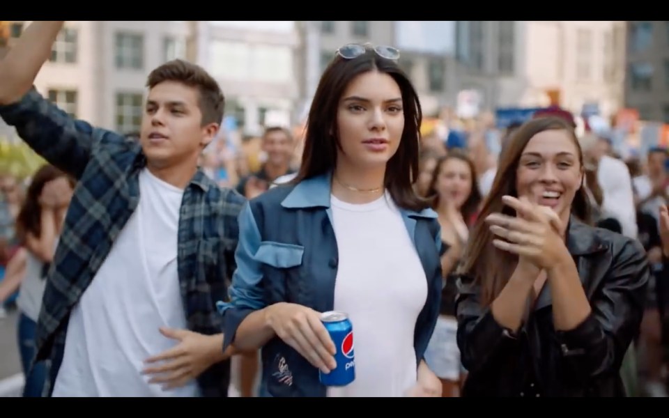 Kendall Jenner sparked outrage in a Pepsi commercial after trying to bring peace between a protester and a police officer