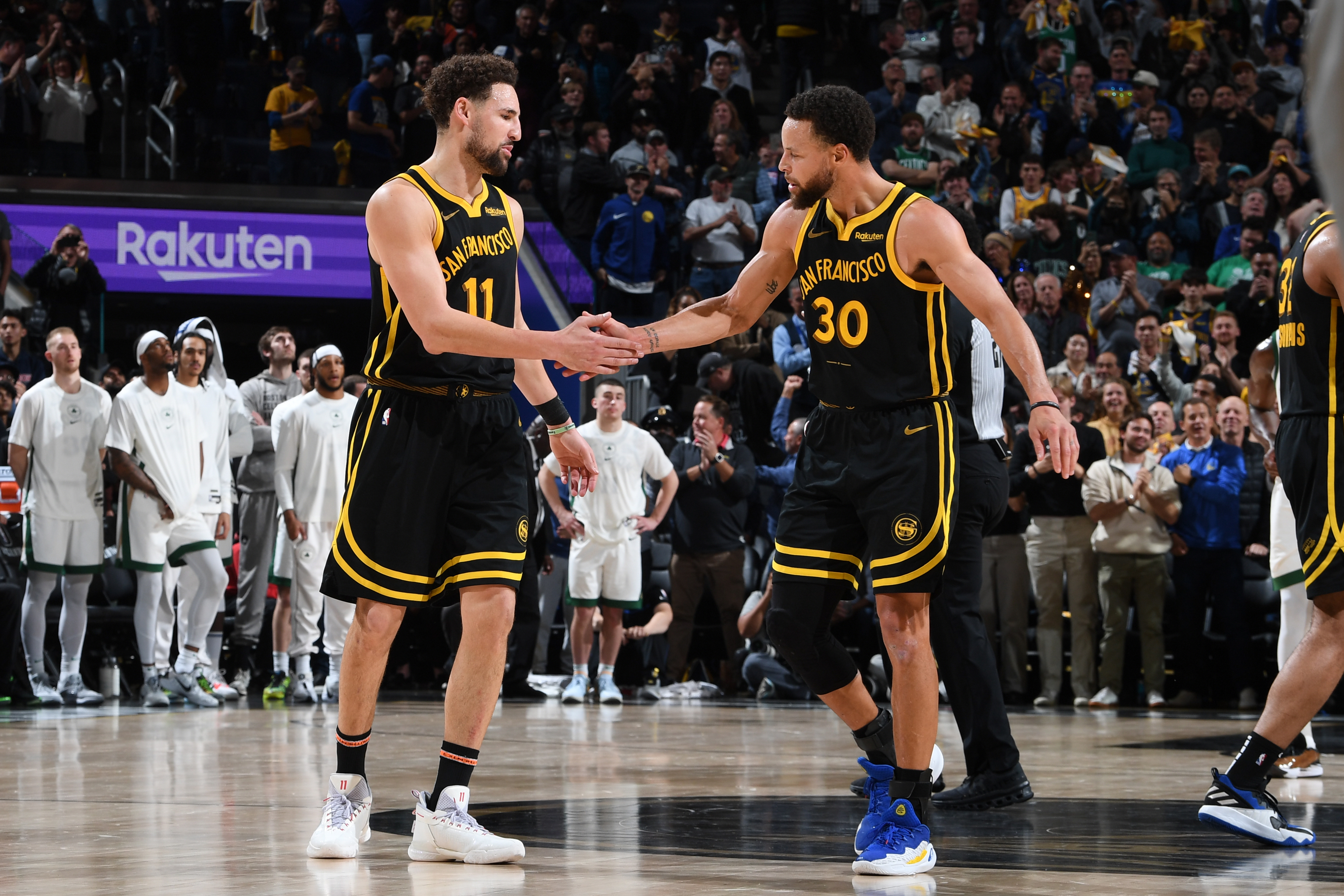 Golden State Warriors star Steph Cury (left) bid farewell to ex-teammate Klay Thompson (right) with a heartbreaking tribute