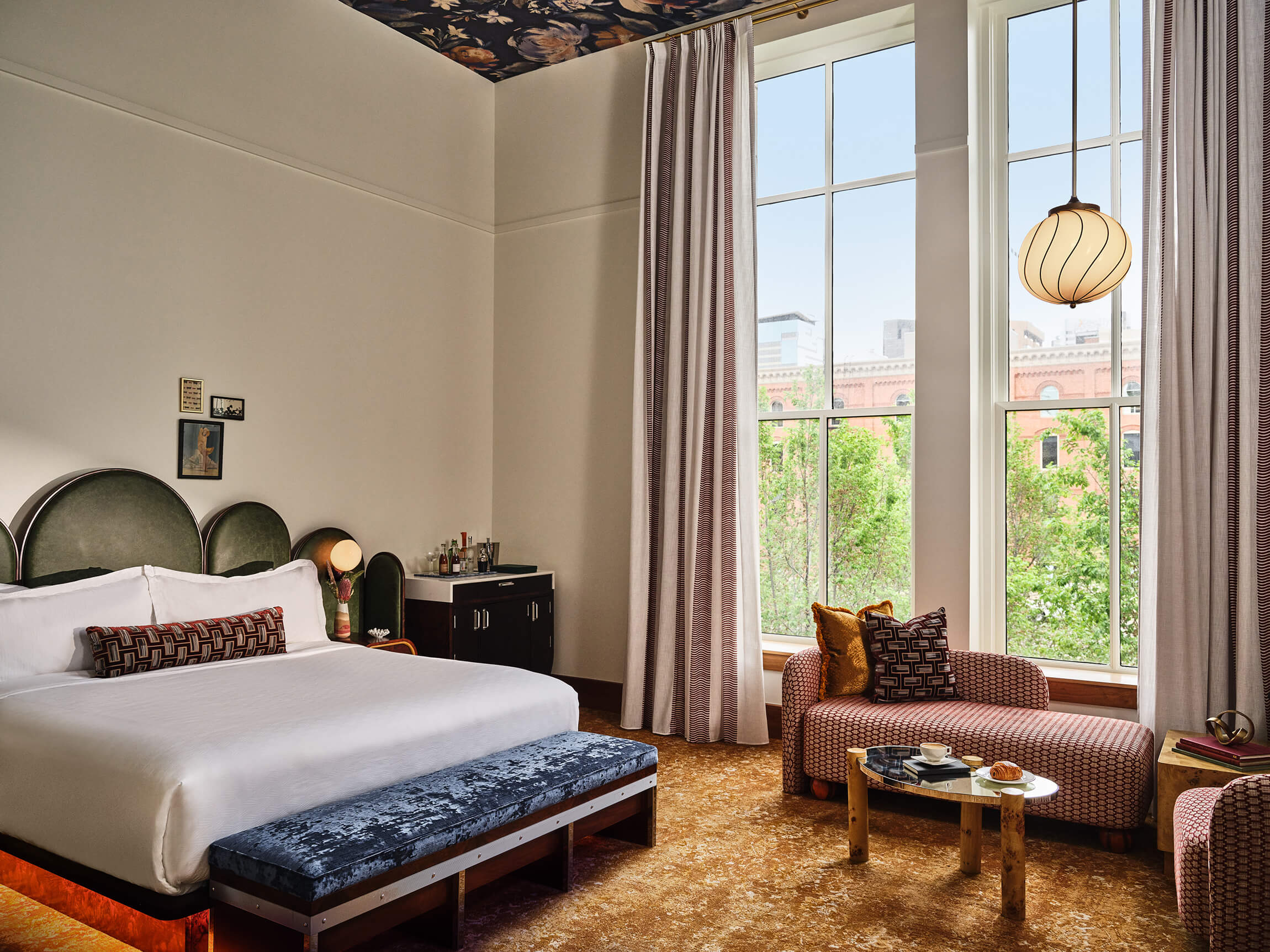 A king bed in the Premium Classic Guest Room at the Crawford Hotel in Denver, Colorado.