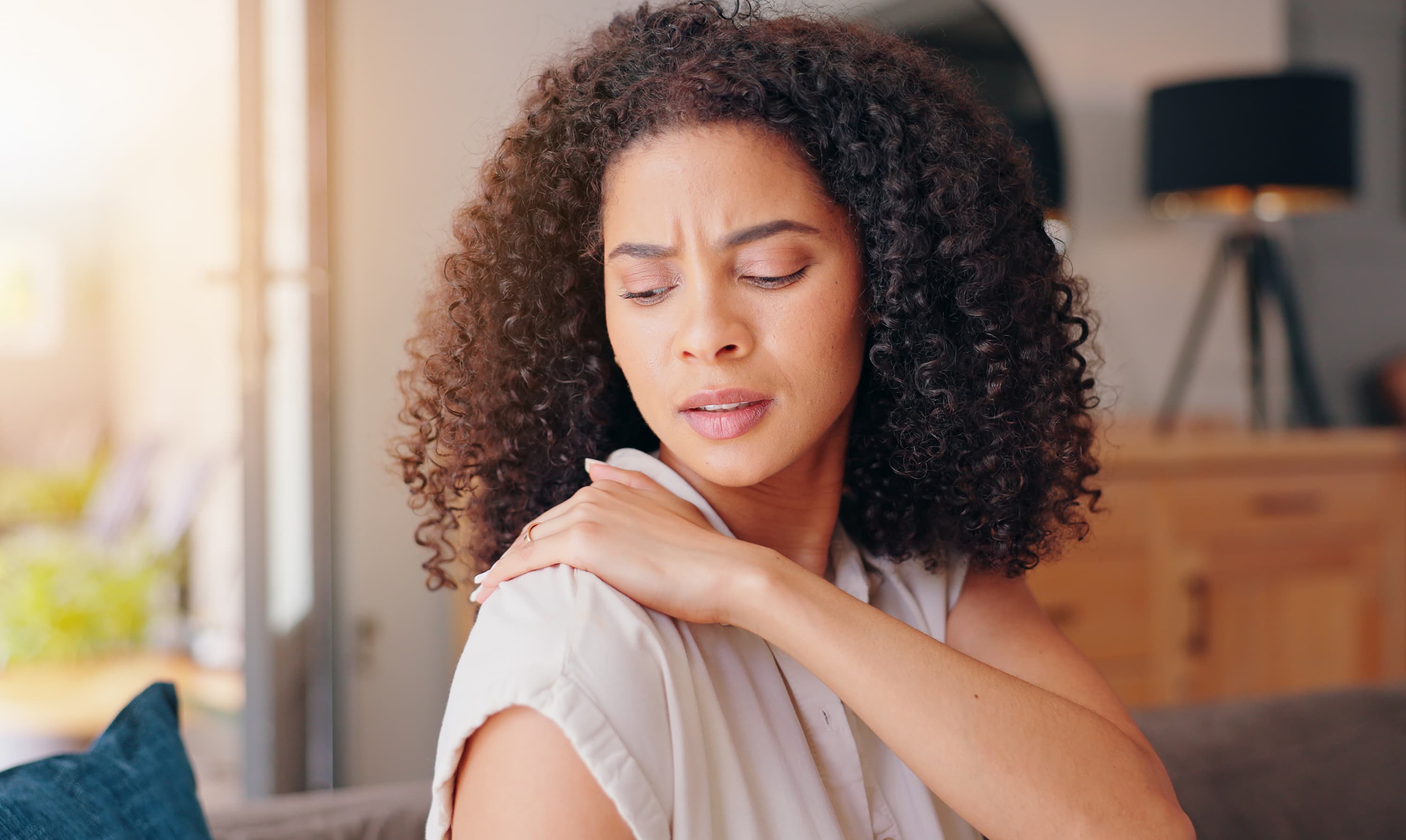 Woman with joint pain and frozen should looks sad.