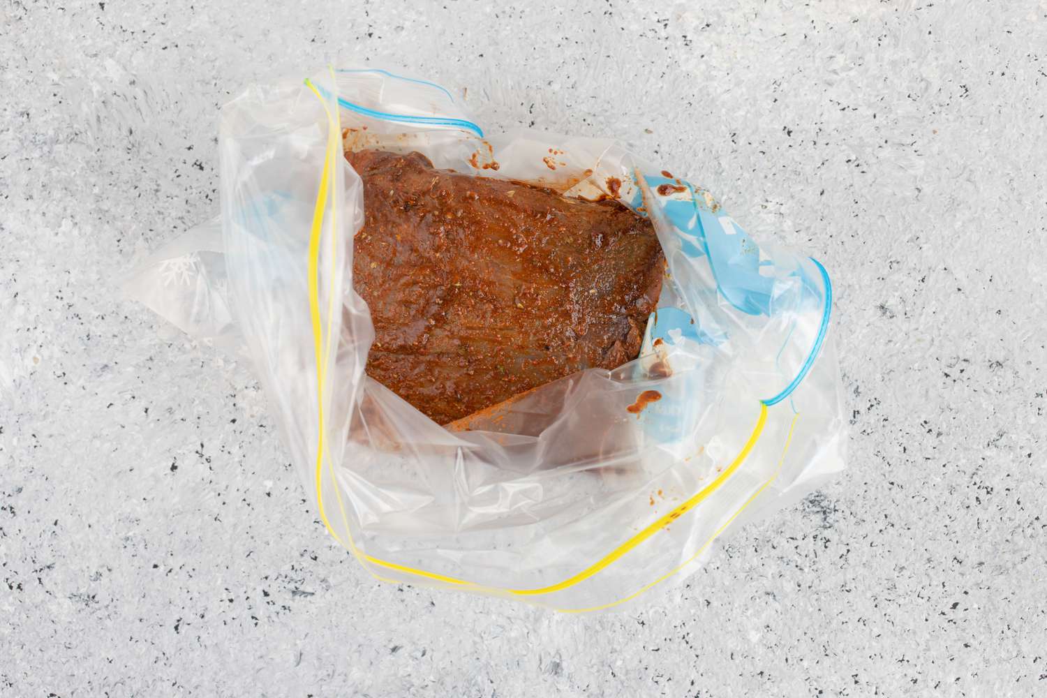 Roast with spice rub placed in a freezer bag