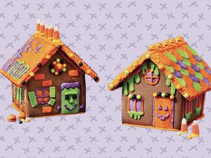 Halloween gingerbread houses collaged on a purple background