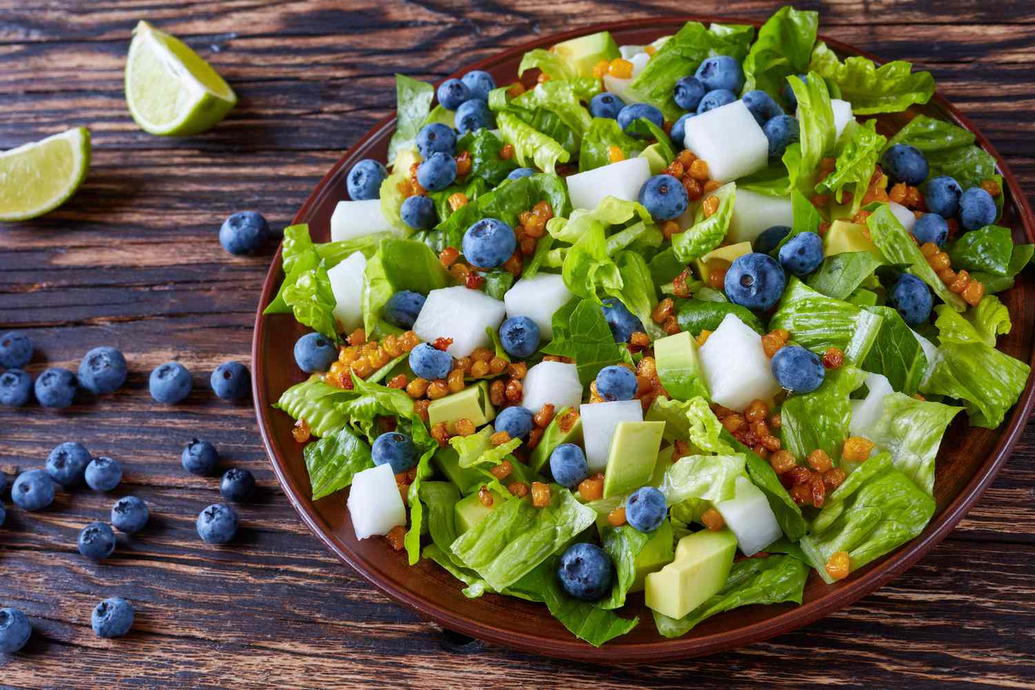 Salad with romaine, jicama, avocado and blueberries