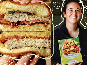 Chicken slider sandwich next to person holding a cookbook