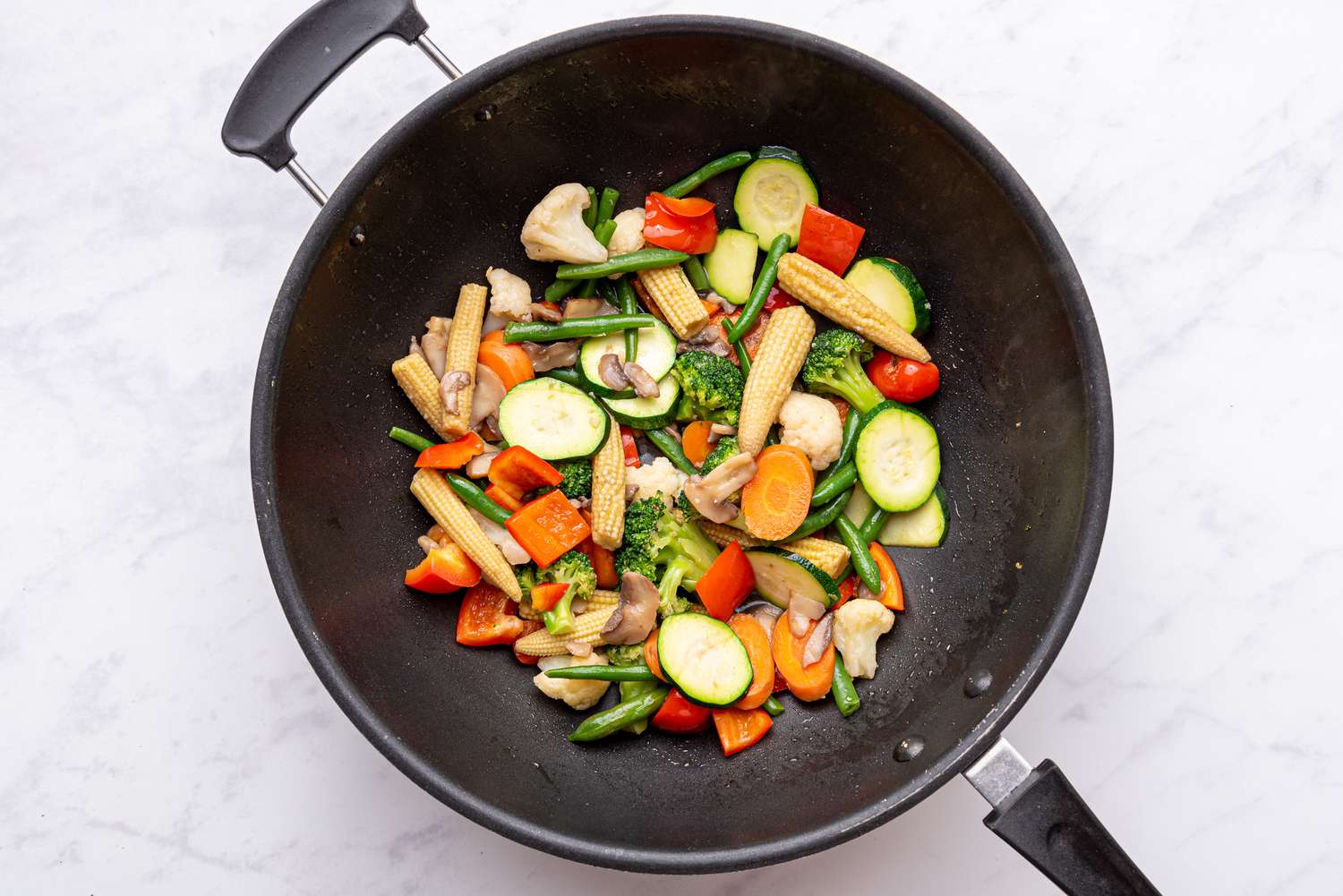 Vietnamese Stir-Fried Mixed Vegetables cooking in a pan 