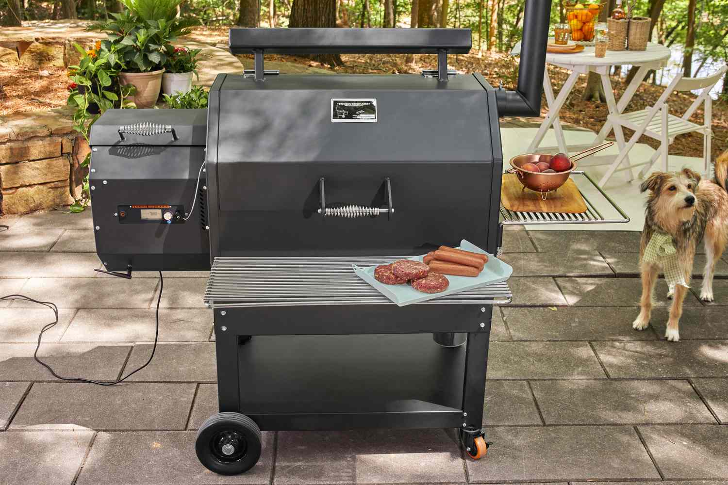 Yoder Smokers YS640S Pellet Grill is displayed on a patio