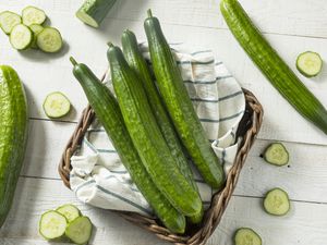 English cucumbers in basket and cut up