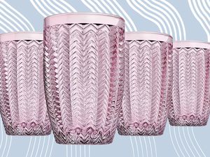 Set of pink highball glasses we recommend displayed on a white and blue patterned background