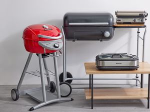 Best electric grills displayed indoors on gray floor