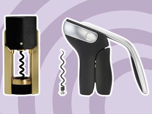 two wine corkscrews against a purple swirl background