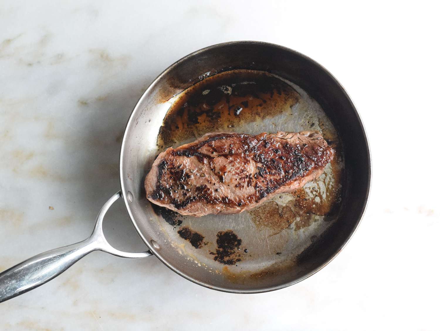 Steak seared in a heavy-bottomed skillet