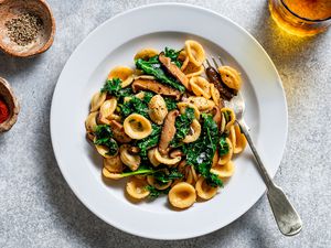 Pasta with shiitake mushrooms and winter greens