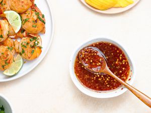 Thai sweet chili sauce in a bowl with a spoon