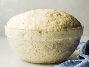 Place dough in bowl