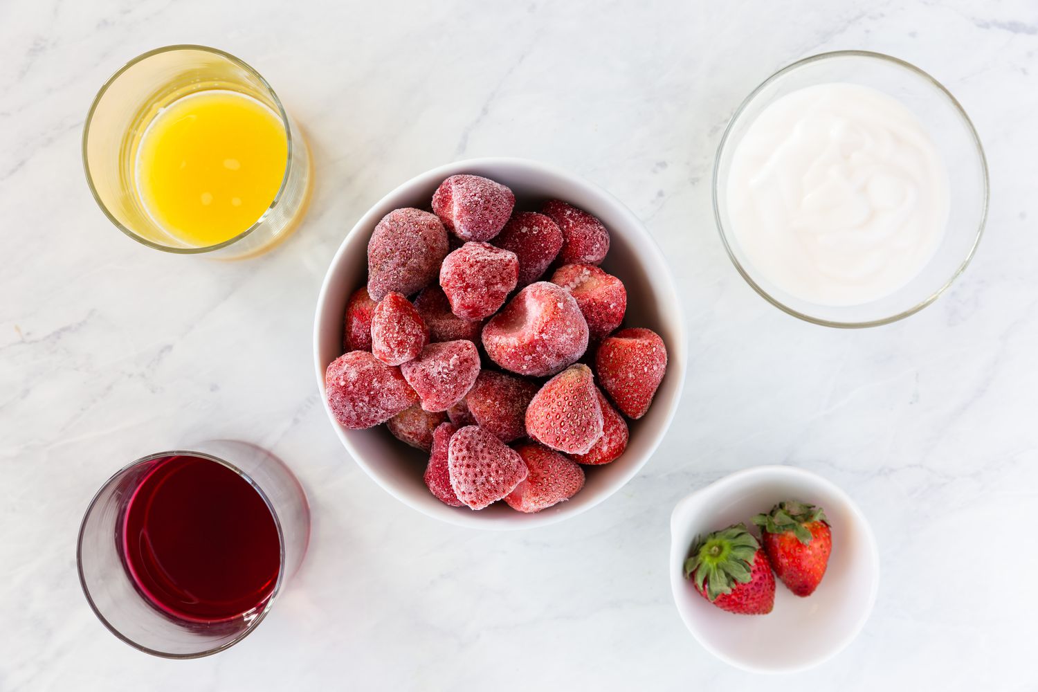 Ingredients gathered for strawberry smoothie