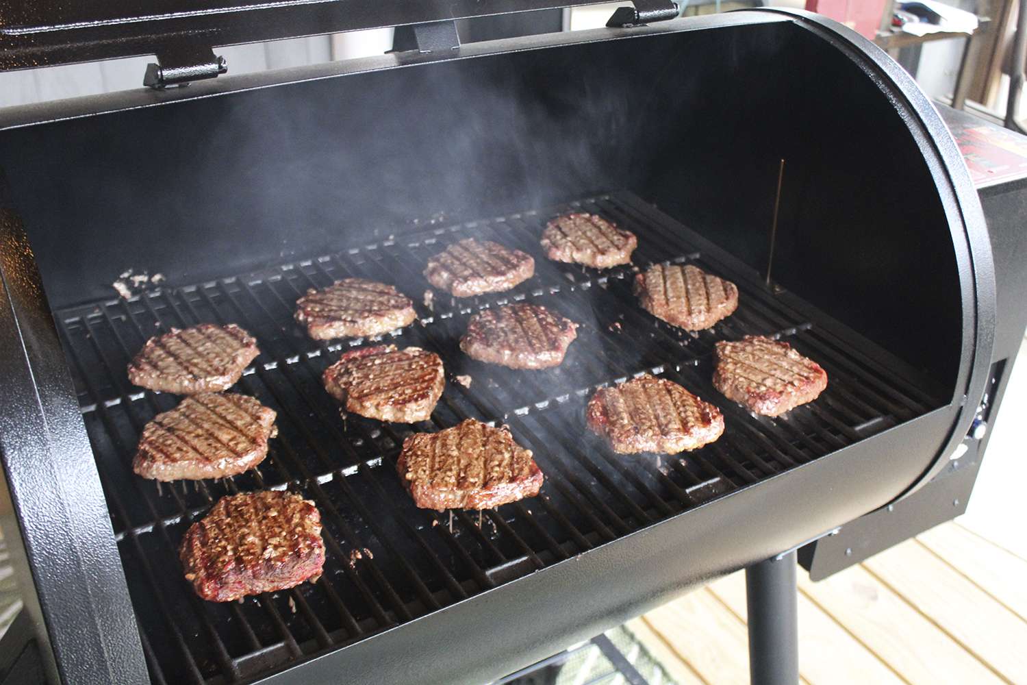 Burgers cooking on a Char Griller Wood Pro Pellet Grill