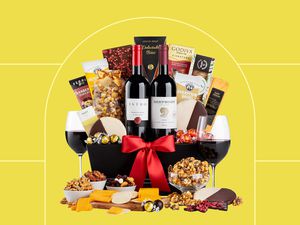 A wine gift basket we recommend on a yellow background