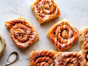 Bread machine cinnamon rolls on a white background