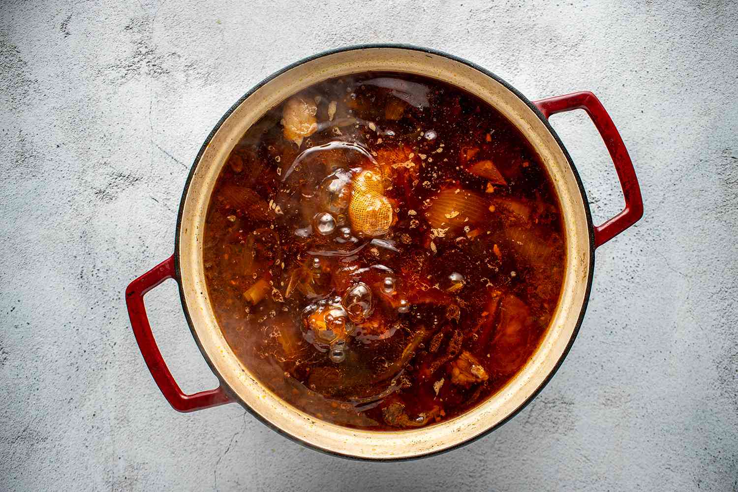 Taiwanese Beef Noodle Soup cooking in a pot 