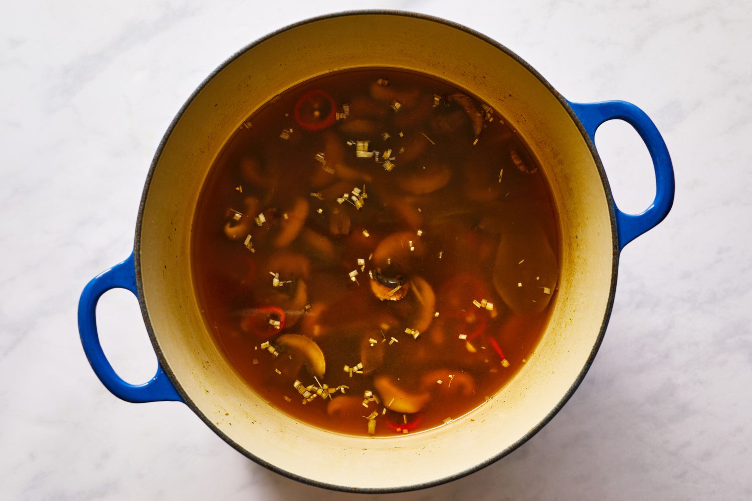  Mushrooms and stock in a large pot 