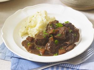 Beef in beer stew served with mash