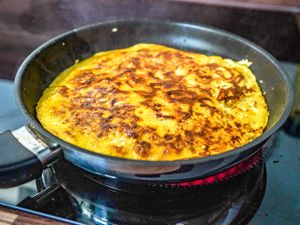 Cooking a Philly cheesesteak omelet