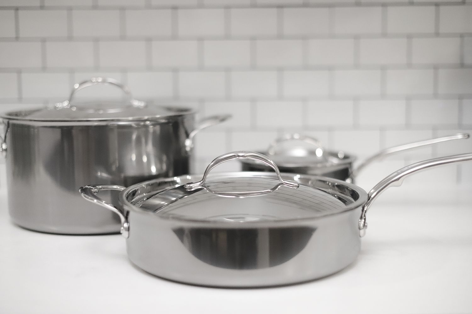 Hestan Nanobond saute pan and stockpot on a white countertop