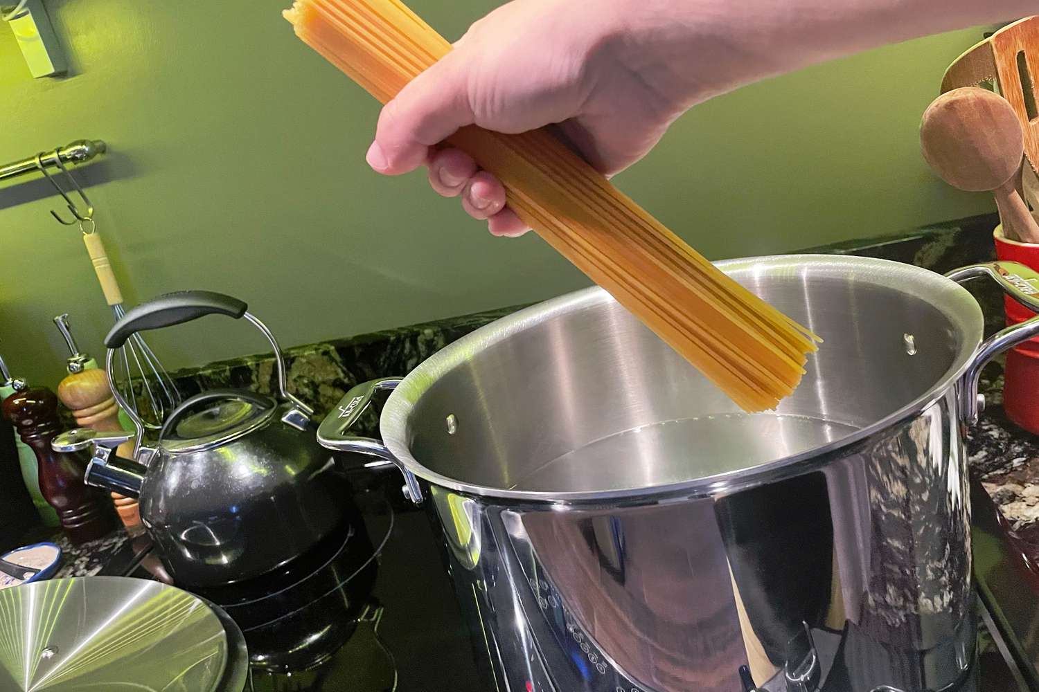 Adding dried pasta to the All-Clad D3 12-quart stockpot