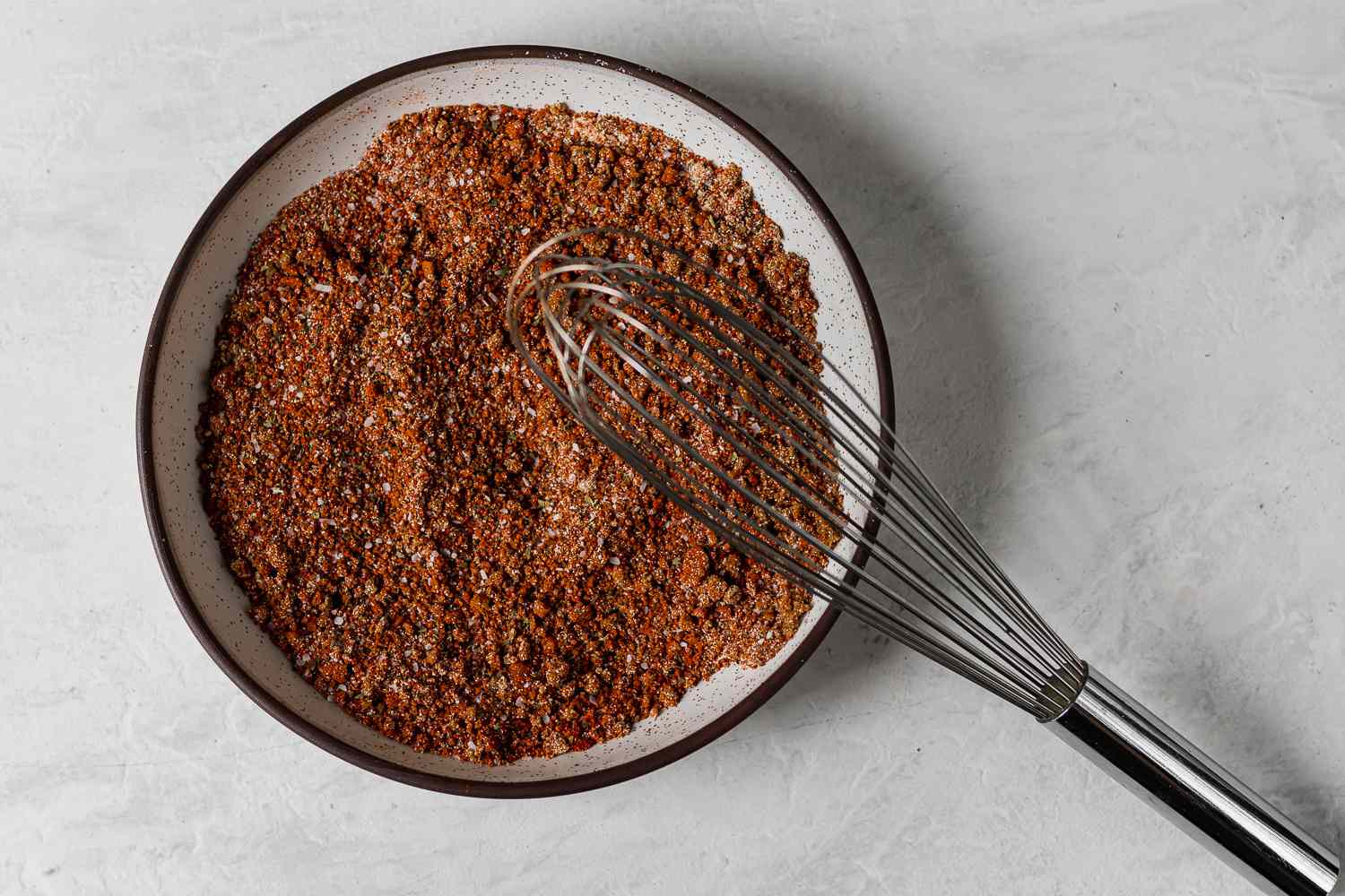 Authentic Texas-Style Brisket Dry Rub spices together in a bowl 