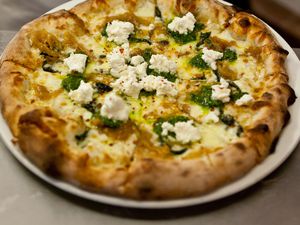 Vegetarian pesto pizza with feta cheese