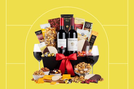 A wine gift basket we recommend on a yellow background