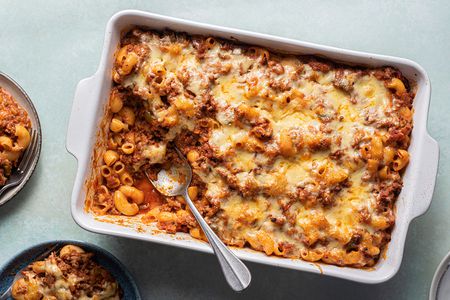 Macaroni and Beef Casserole in a baking dish with a spoon 