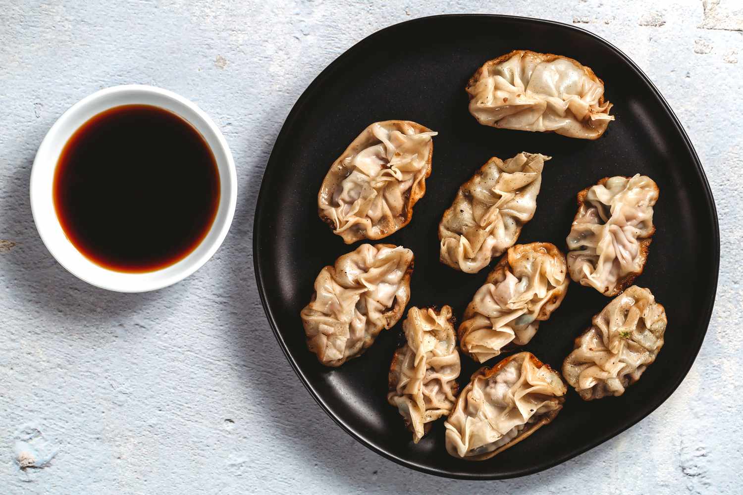 Dumplings served with dipping sauce