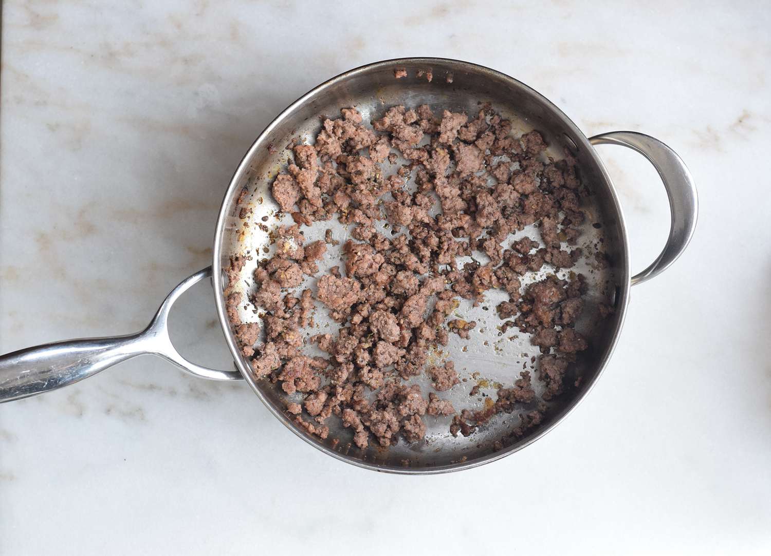 ground beef browned in a pan