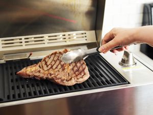 Grilling a steak on the Kenyon city grill 