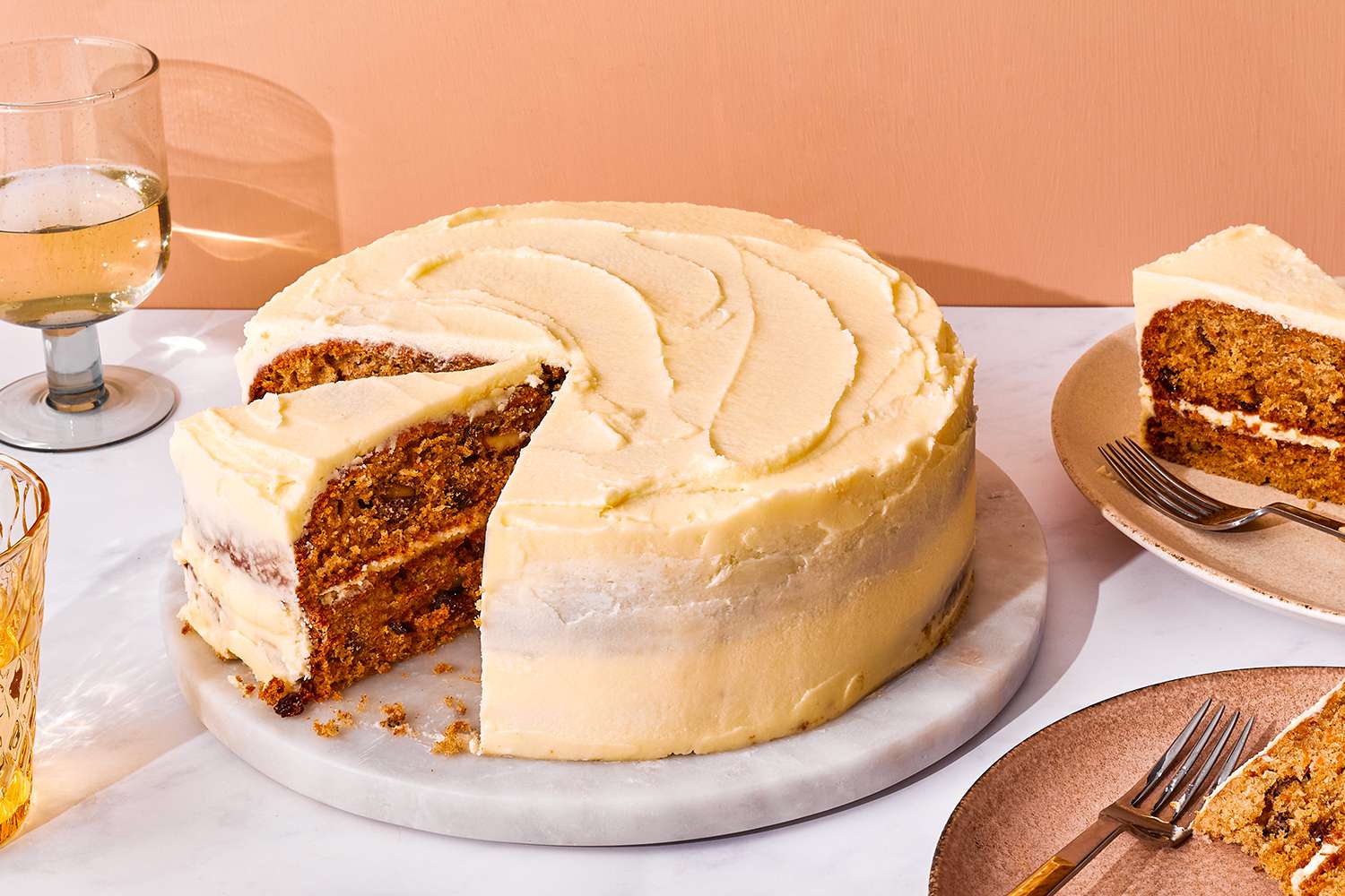 Gluten-Free Carrot Cake and slices on plates 