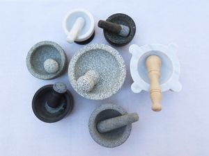 A variety of mortar and pestle sets on a white background