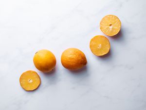 Meyer lemons, whole and cut in half