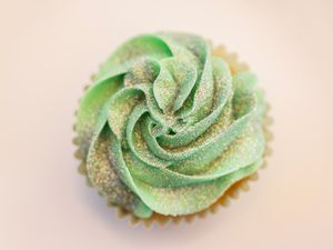 A cupcake topped with edible glitter